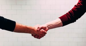 Handshake following a commercial dispute resolution