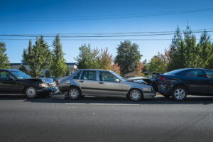 A car accident involving three vehicles
